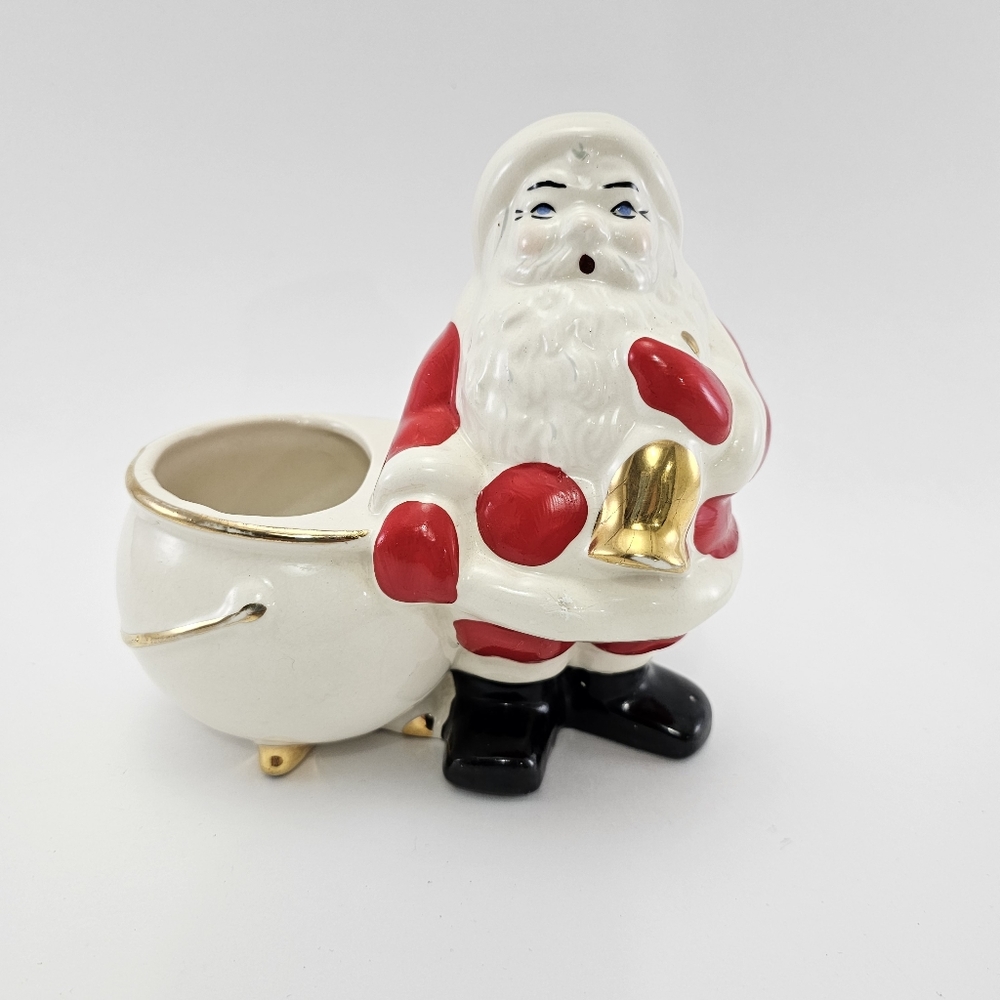 Santa Clause Ceramic Planter with gold look accents. 6.5"t